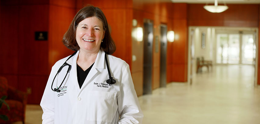 Headshot of Dr. Susan Hulsemann in a hospital lobby.