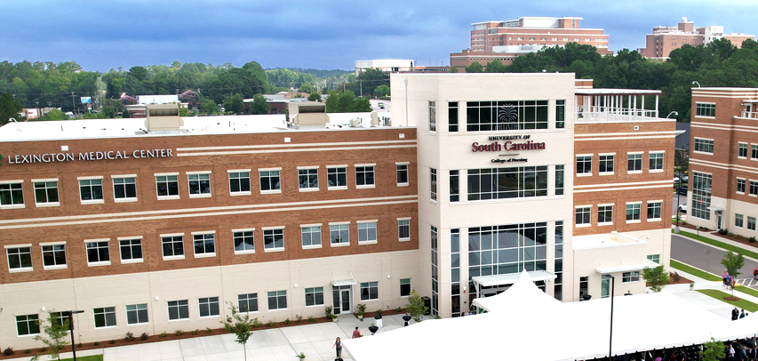 Architectural building render for the future site of the three-story Graduate Medical Education building featuring a rooftop patio.